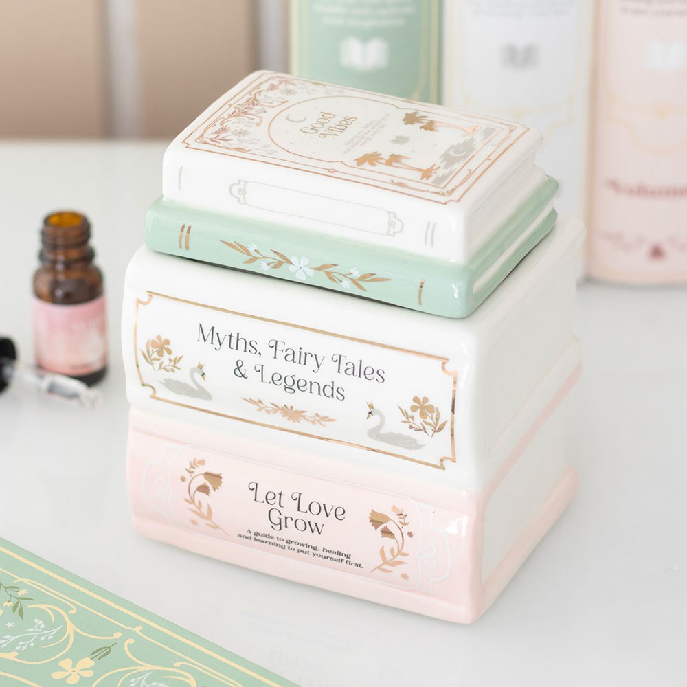 Bruleur pile de livres pastel