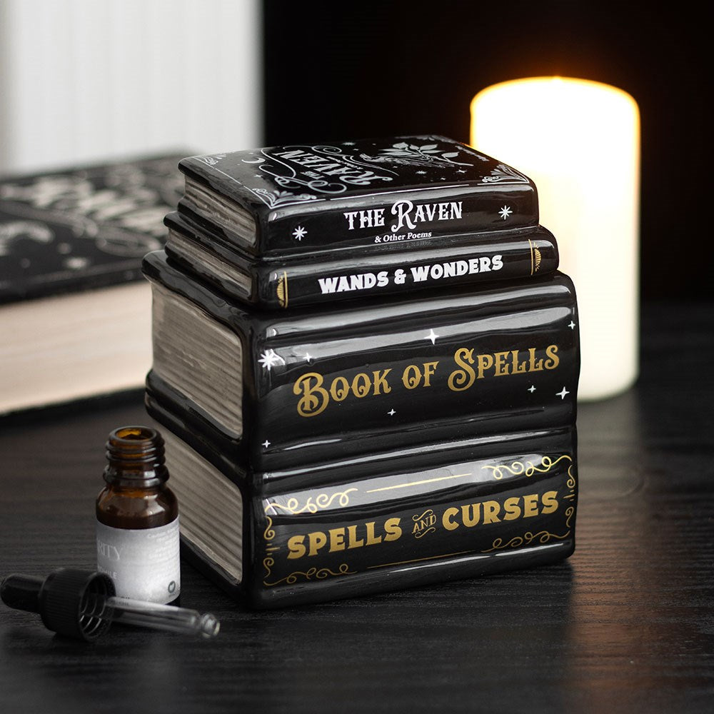 Bruleur pile de livres book of spells