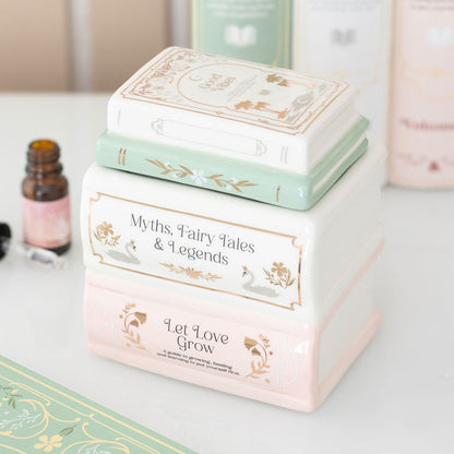 Bruleur pile de livres pastel