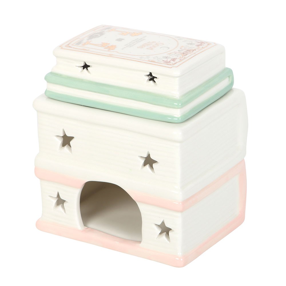 Bruleur pile de livres pastel