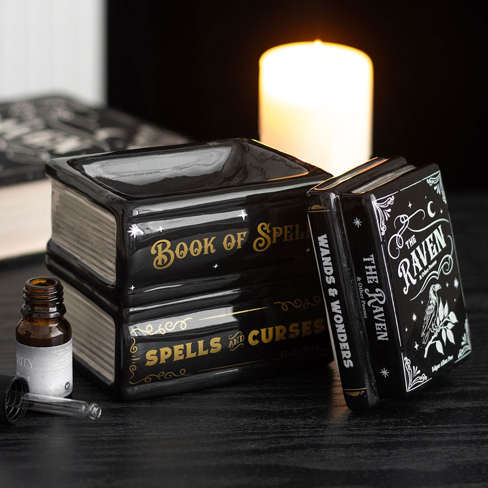 Bruleur pile de livres book of spells