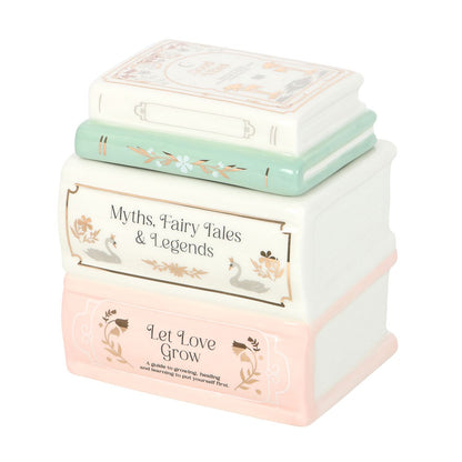 Bruleur pile de livres pastel